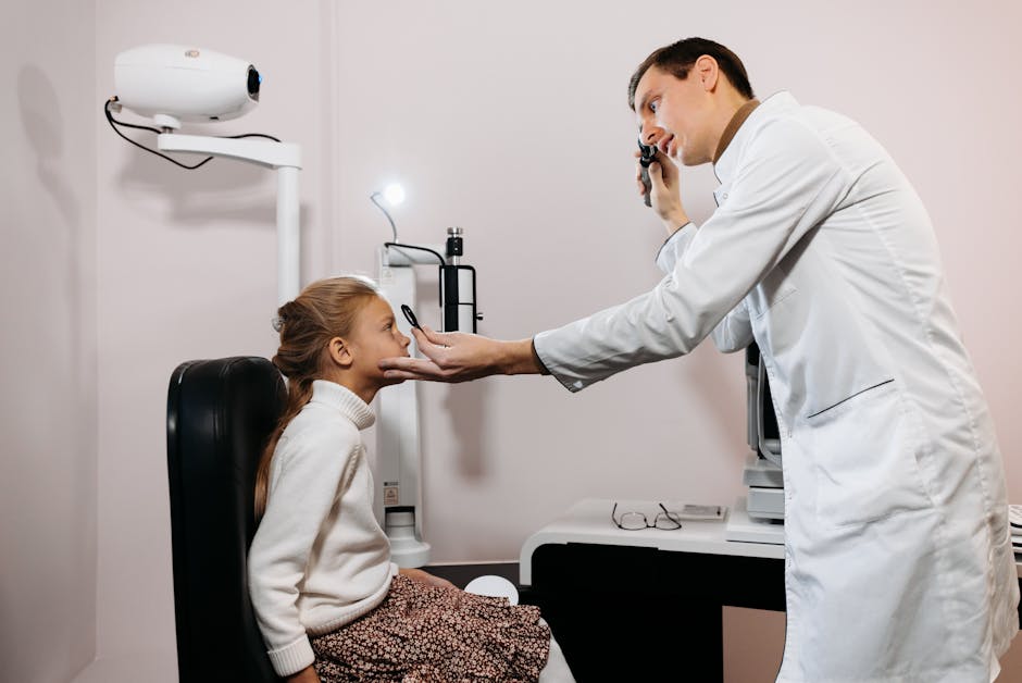 optometrist evaluating patient focus with specialized equipment optometrist evaluating patient focus with specialized equipment